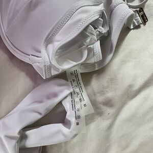 swim suit, tried on but too big